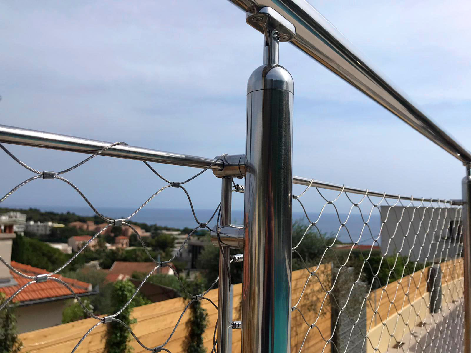 IMPERIA - Railings with steel rod with stainless steel net and tubular handrail diameter 42